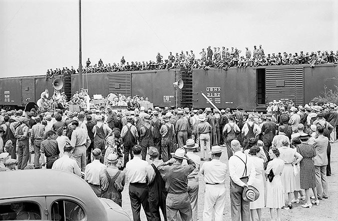 The Lincoln, Nebraska-area Burlington Band performed on a platform at the Havelock shops for a 1943 flag presentation ceremony. The Lincoln, Nebraska-area Burlington Band performed on a platform at the Havelock shops for a 1943 flag presentation ceremony.