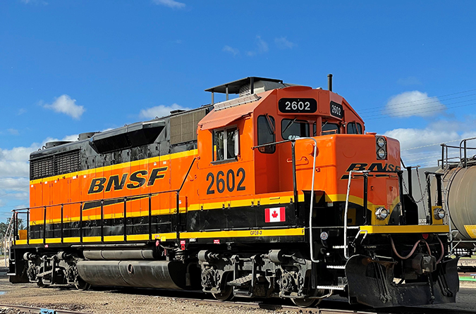 BNSF 2602 proudly displays a Canadian flag while serving our customers in Winnipeg. BNSF 2602 proudly displays a Canadian flag while serving our customers in Winnipeg.