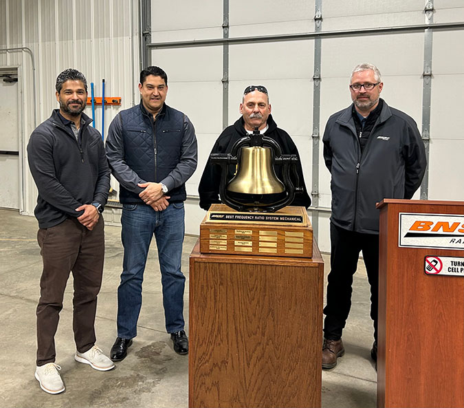 Don Eslinger, second from right, celebrates the shop’s recent Safety Bell achievement with Keith Solomons, vice president, Mechanical; Edmundo Rodriguez, assistant vice president and chief mechanical officer; and Justin Miller, general foreman, Mechanical. Don Eslinger, second from right, celebrates the shop’s recent Safety Bell achievement with Keith Solomons, vice president, Mechanical; Edmundo Rodriguez, assistant vice president and chief mechanical officer; and Justin Miller, general foreman, Mechanical.