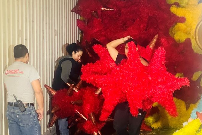 Colorful piñatas arrive in a container for Dulcelandia. Colorful piñatas arrive in a container for Dulcelandia.