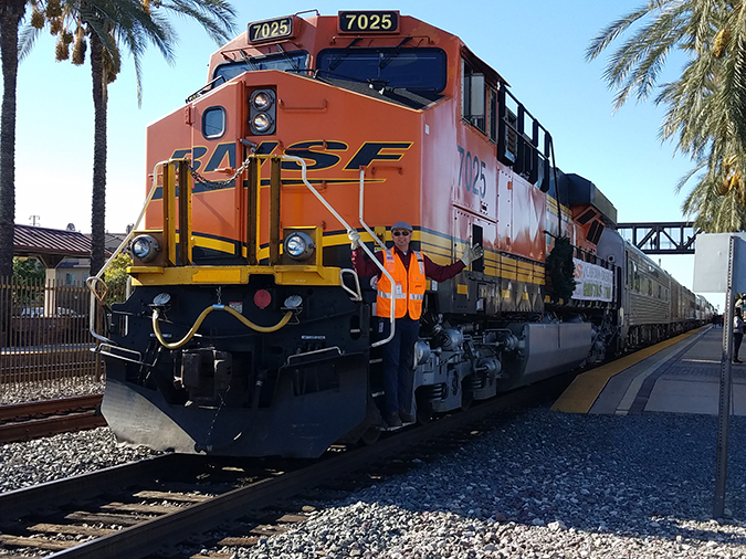 Tumbas with locomotive 7025, which was used in the Southern California Christmas Train in 2019 that he volunteered to operate. Tumbas with locomotive 7025, which was used in the Southern California Christmas Train in 2019 that he volunteered to operate.