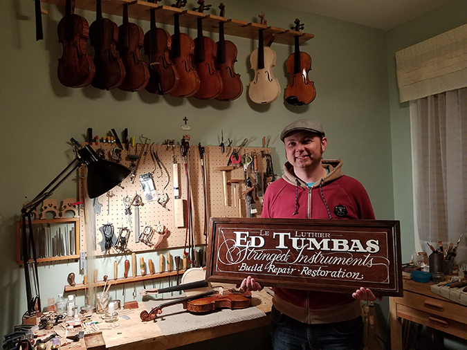 Tumbas in his violin workshop. Tumbas in his violin workshop.