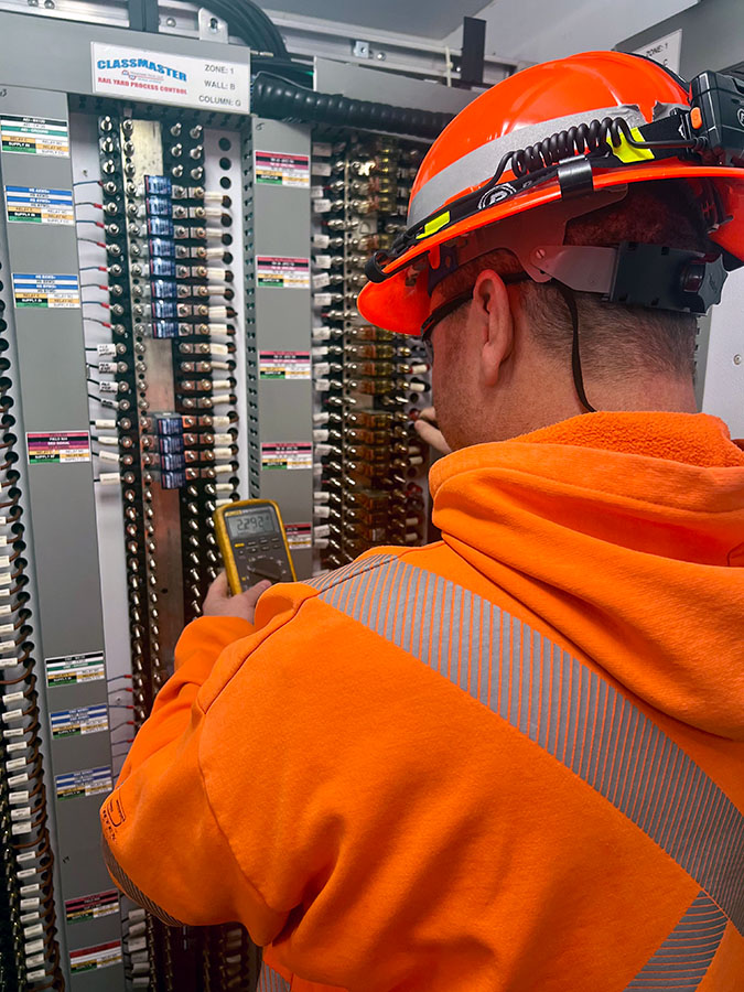 Locke checks track circuit voltages. Locke checks track circuit voltages.