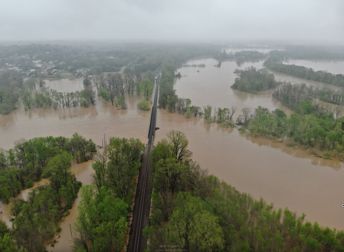 High water reaches the track in the Thayer South Subdivision. High water reaches the track in the Thayer South Subdivision.