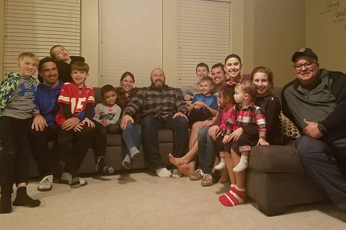 From L-R, Trent Dunlap, manager, Transportation Training; Jeremy Dittmer, brakeman; Mark Fleet, senior IT business consultant; Tom Soper, locomotive engineer, and their families From L-R, Trent Dunlap, manager, Transportation Training; Jeremy Dittmer, brakeman; Mark Fleet, senior IT business consultant; Tom Soper, locomotive engineer, and their families