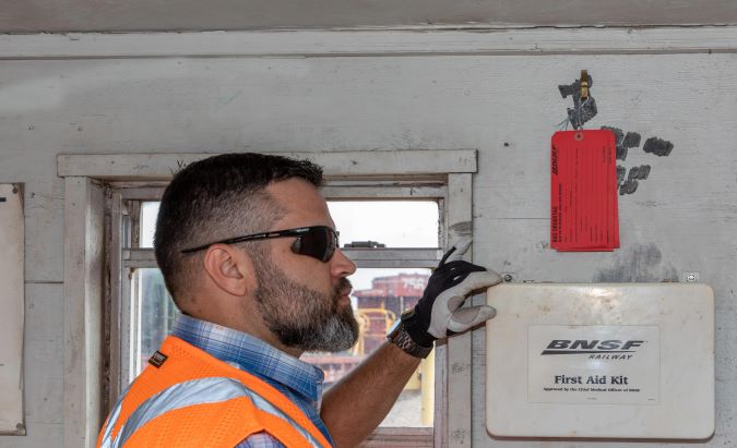 Galindo closing a first aid kit. Galindo closing a first aid kit.