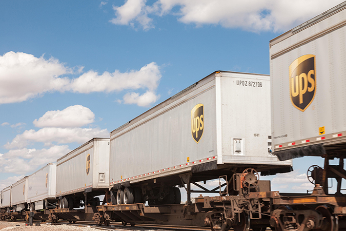 UPS trailers on flat cars UPS trailers on flat cars