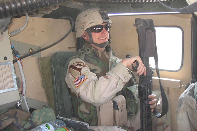 Fisher in Iraq, during his deployment Fisher in Iraq, during his deployment