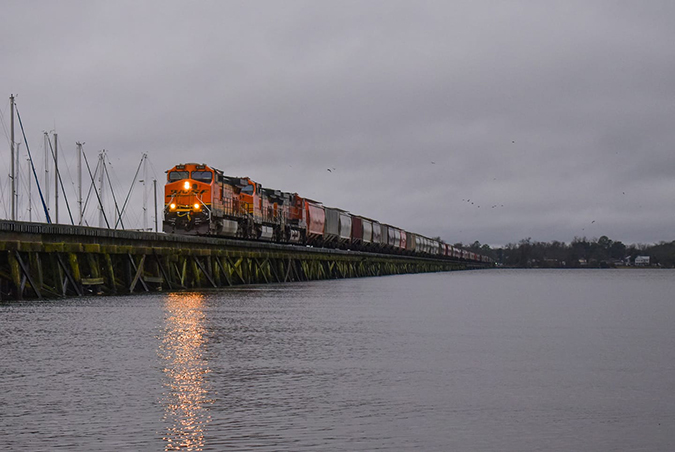 A trio of BNSF locomotives on Norfolk Southern’s Neuse River bridge in New Bern, North Carolina, was captured by Jon Celotto. A trio of BNSF locomotives on Norfolk Southern’s Neuse River bridge in New Bern, North Carolina, was captured by Jon Celotto.