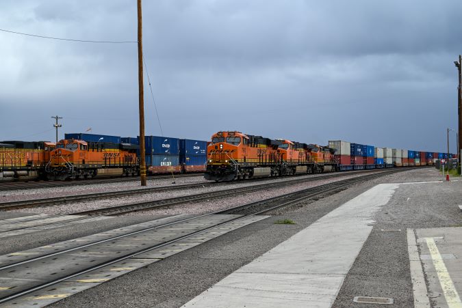 Intermodal trains at the BNSF terminal in Needles, California. Intermodal trains at the BNSF terminal in Needles, California.