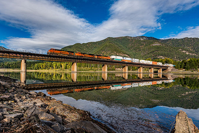 BNSF train crosses the Clark Fork River at Noxon, Montana BNSF train crosses the Clark Fork River at Noxon, Montana
