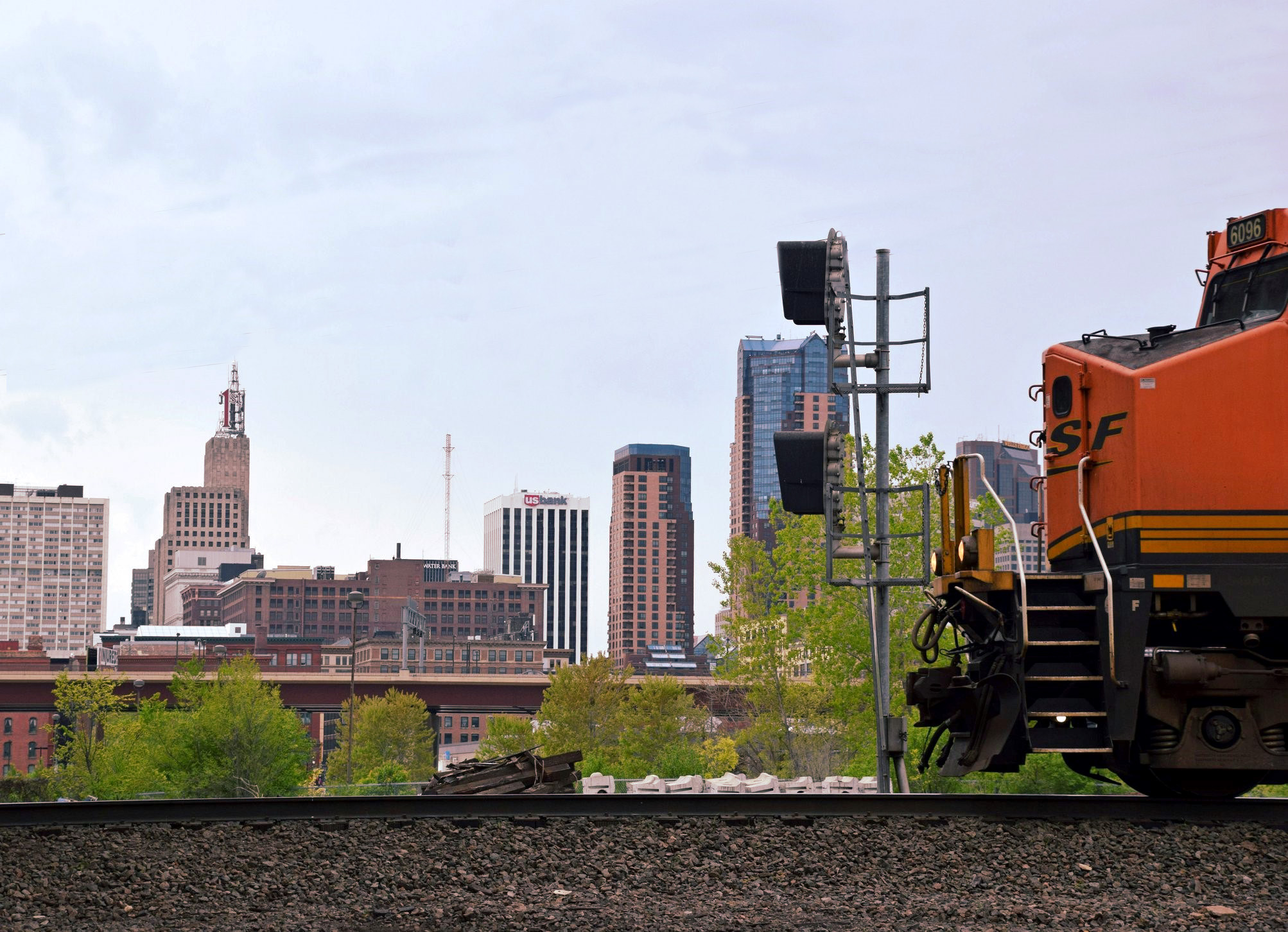 A BNSF locomotive passes the St. Paul skyline A BNSF locomotive passes the St. Paul skyline