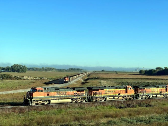 A BNSF train waits while another passes by at the completed bypass. A BNSF train waits while another passes by at the completed bypass.